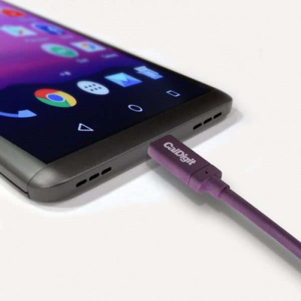 CalDigit USB-C cable connected to the USB-C port of a mobile phone.