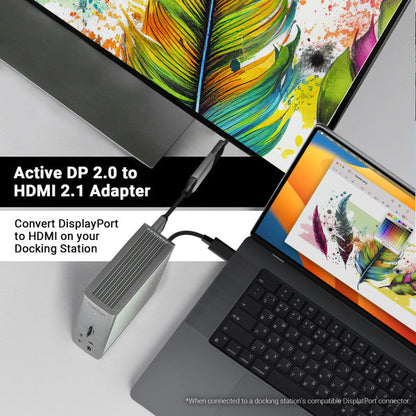 Active DP 2.0 to HDMI 2.1 Adapter connected to dock, and the dock is connected to a laptop. Text on the image says "Active DP 2.0 to HDMI 2.1 Adapter", and "Convert DisplayPort to HDMI on your docking station".