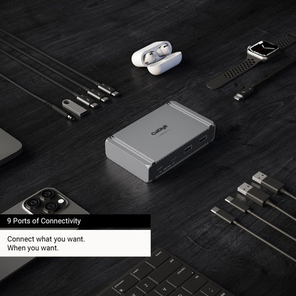 Element 5 Hub on a desk with cables next to the ports. Text on the image says "9 Ports of Connectivity", and "Connect what you want. When you want.".