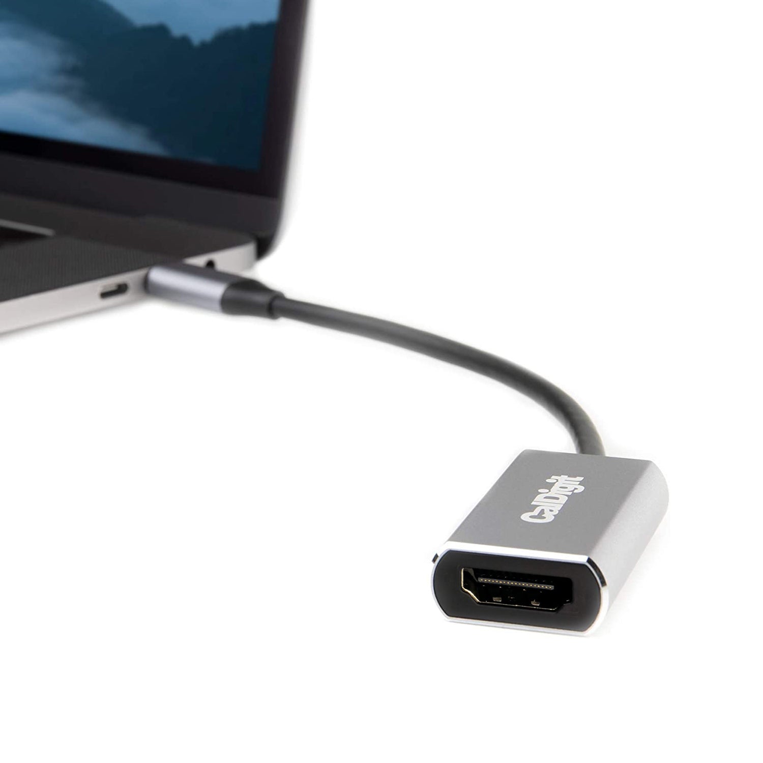 USB-C to HDMI Adapter connected to a MacBook Pro on a white background.